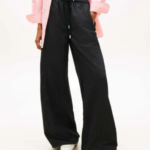 JOGGER LARGO NERO TOMMY JEANS CON ELASTICO LOGATO DA DONNA