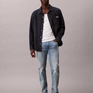 JEANS IN DENIM CHIARO CALVIN KLEIN SLIM STRAIGHT DA UOMO